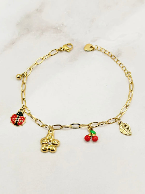 Bracelet with red charms, Gold