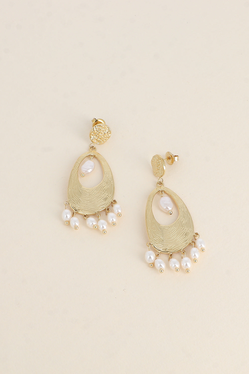 earrings, hammered oval