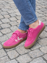 Fuxia Suede, Sport